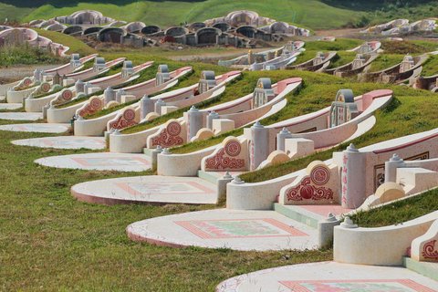 Rows of ornate, colorful tombstones.