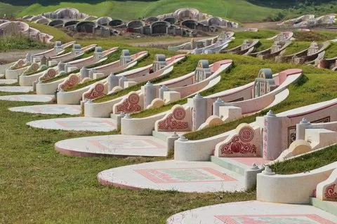 Rows of ornate, colorful tombstones.